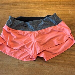 salmon color size 6 lululemon shorts